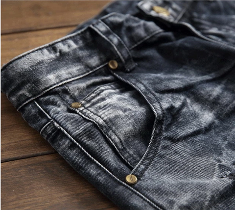 Black faded designer jeans